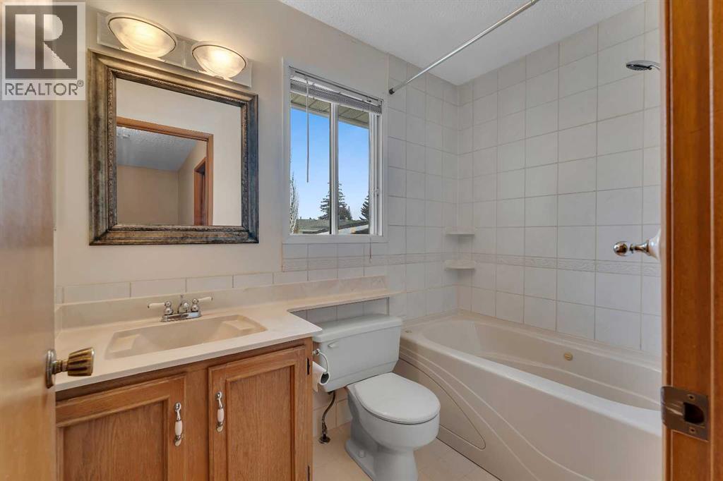 20 Woodbrook Place SW, Calgary, Alberta  T2W 3Z4 - Photo 17 - A2290893