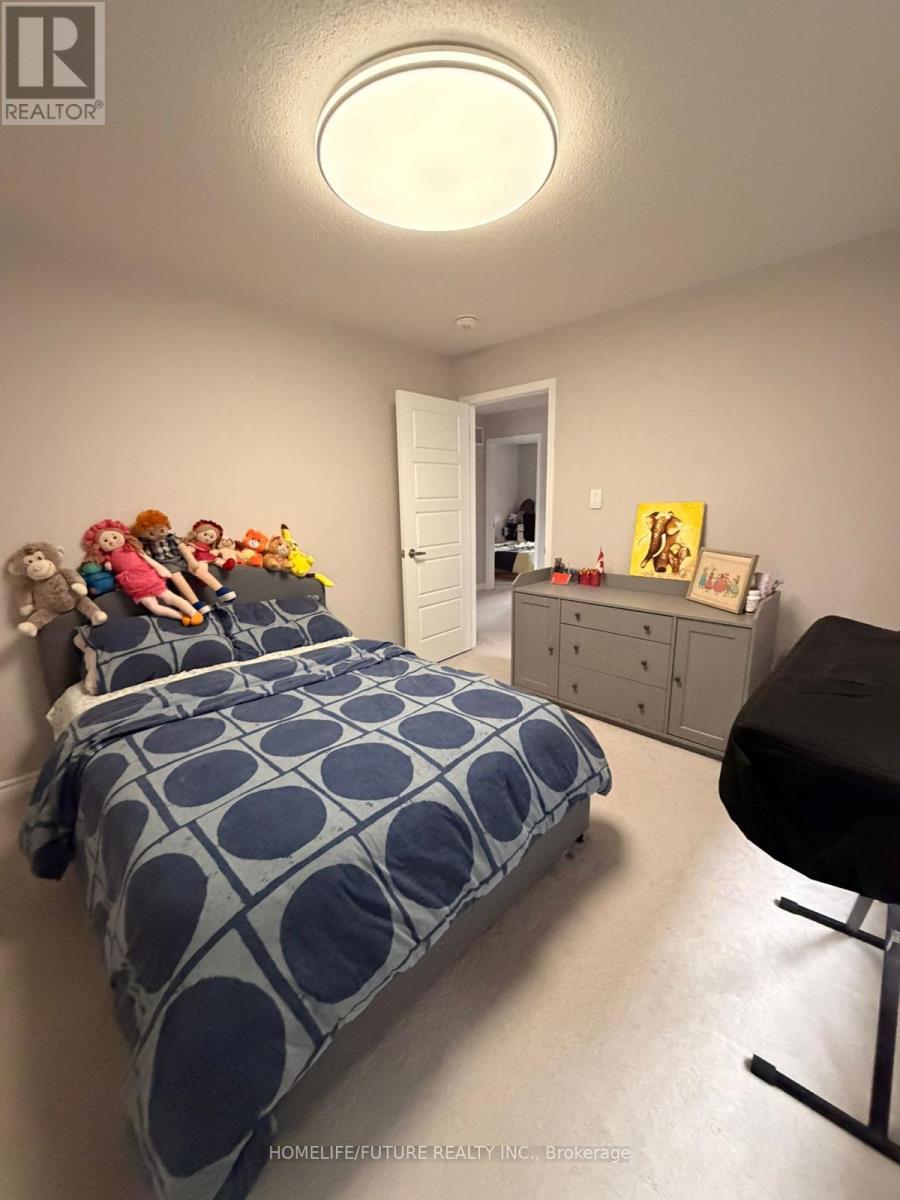 143 Yates Drive, Milton, Ontario  L9E 1S7 - Photo 3 - W12893876