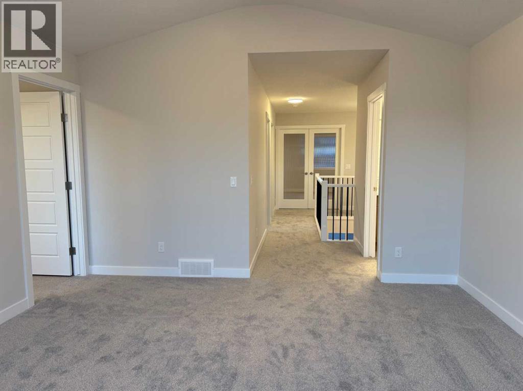 51 Sunrise Heath, Cochrane, Alberta  T4C 3C5 - Photo 33 - A2256885