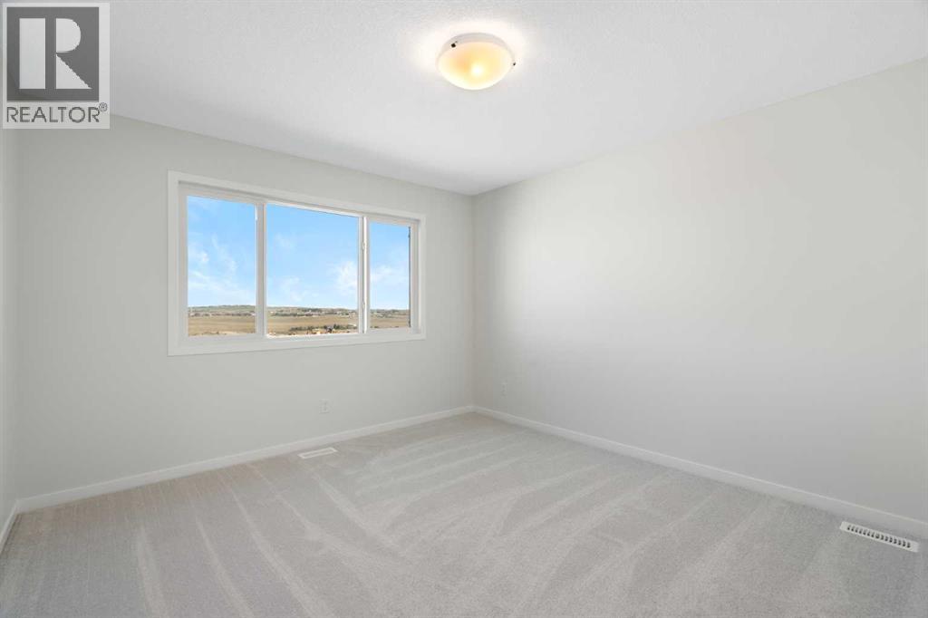 42 Creekview Avenue Sw, Calgary, Alberta  T2X 6M1 - Photo 9 - A2294594