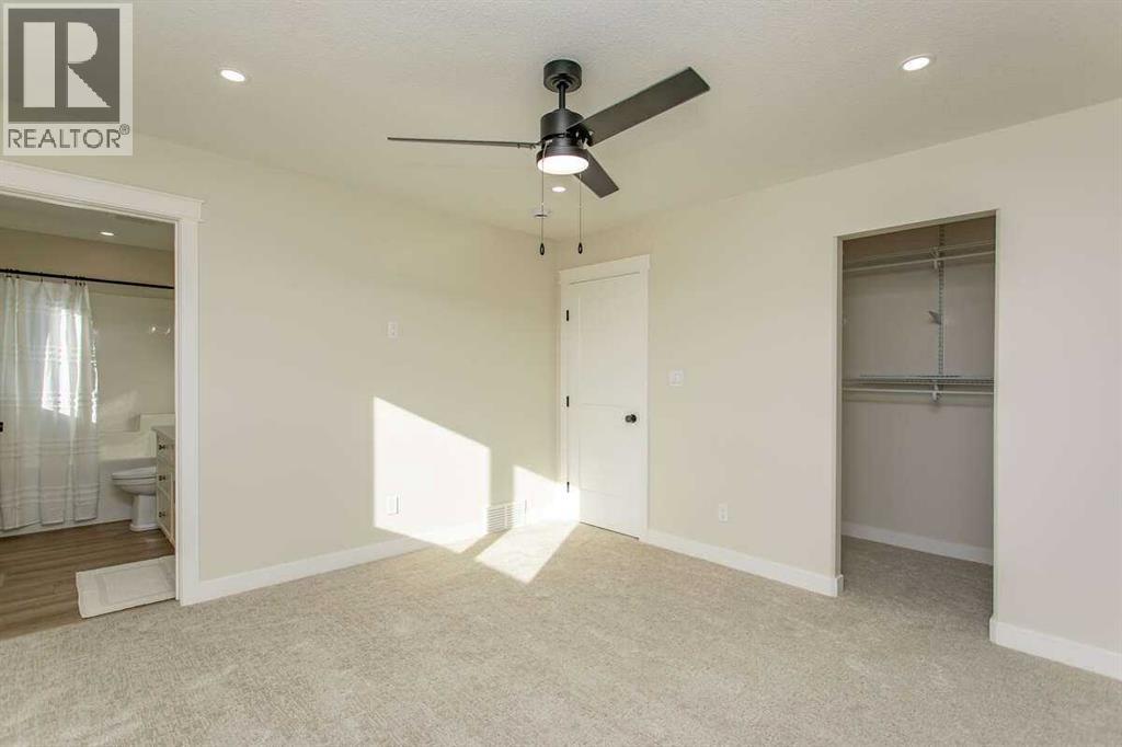 44 Oxford Boulevard, Penhold, Alberta  T0M 1R0 - Photo 20 - A2289523