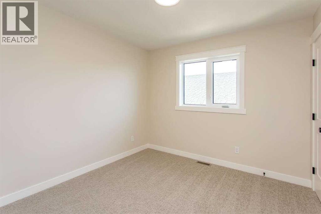 44 Oxford Boulevard, Penhold, Alberta  T0M 1R0 - Photo 23 - A2289523