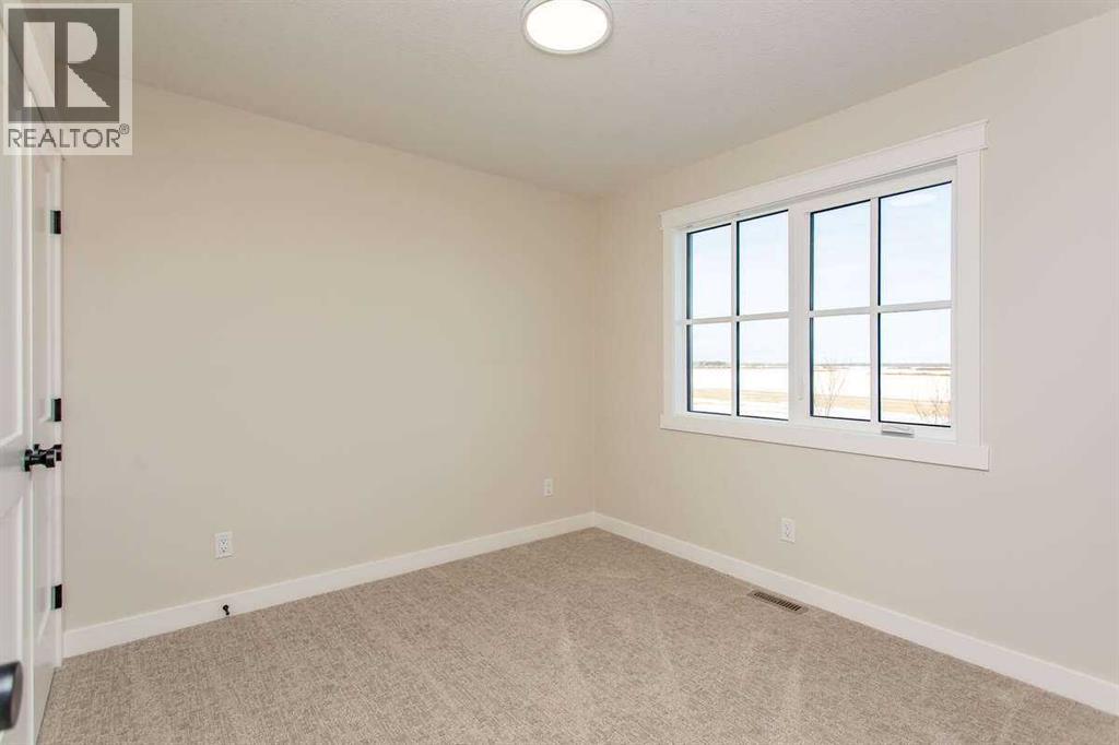 44 Oxford Boulevard, Penhold, Alberta  T0M 1R0 - Photo 26 - A2289523