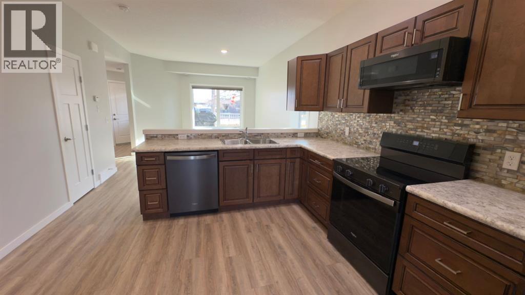 501 5 Street W, Hanna, Alberta  T0J 1P0 - Photo 22 - A2295220