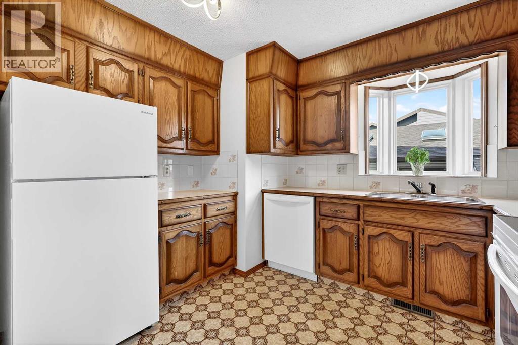 5027 Norris Road NW, Calgary, Alberta  T2K 5R6 - Photo 19 - A2293197