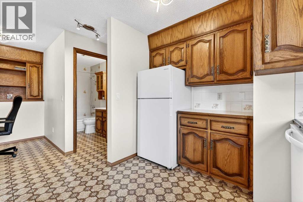 5027 Norris Road NW, Calgary, Alberta  T2K 5R6 - Photo 22 - A2293197