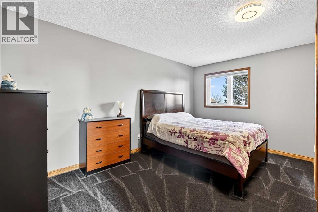 5027 Norris Road NW, Calgary, Alberta  T2K 5R6 - Photo 33 - A2293197