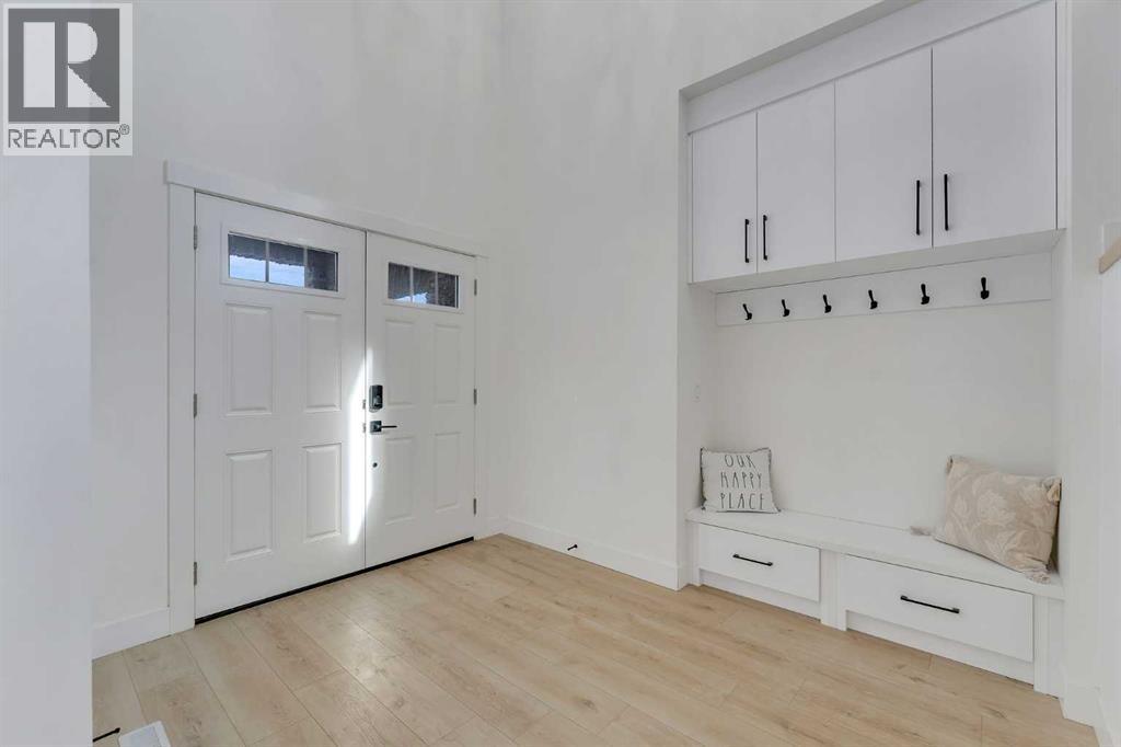 247 Coopers Cove Sw, Airdrie, Alberta  T4B 4C3 - Photo 2 - A2294398