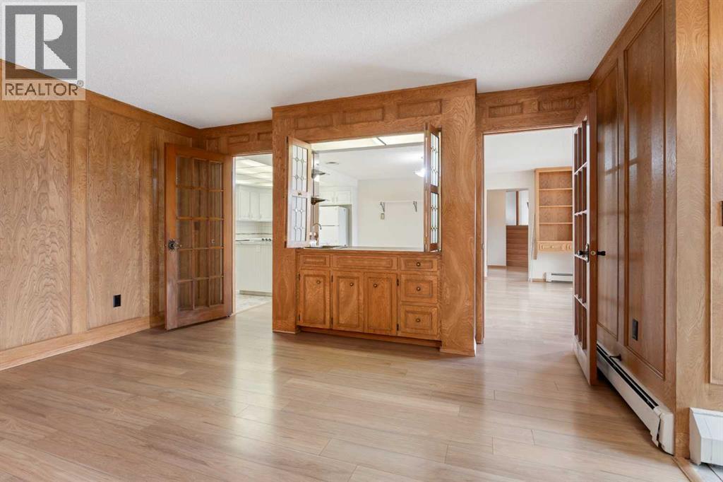 1008 Shawnee Drive SW, Calgary, Alberta  T2Y 2T9 - Photo 7 - A2279086