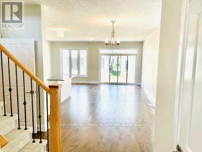 147 Ian Ormston Drive, Kitchener, Ontario  N2P 0K3 - Photo 4 - X12906406