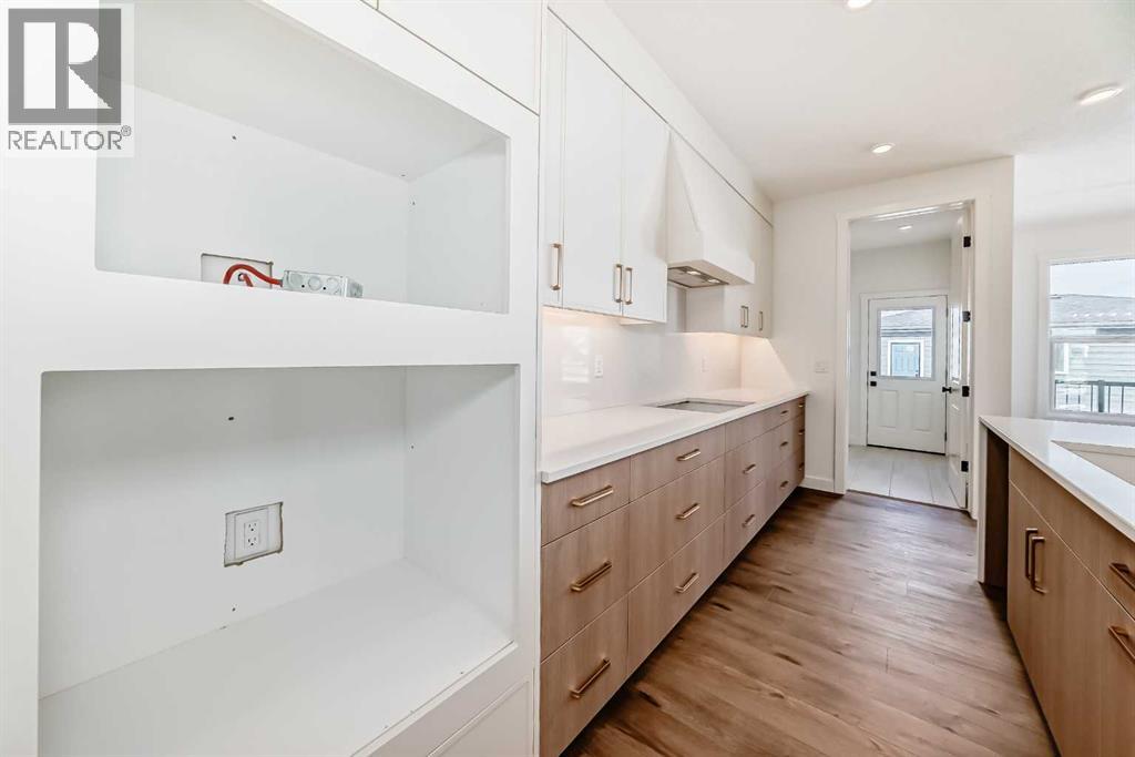 206 Harmony Circle, Rural Rocky View County, Alberta  T3Z 0H8 - Photo 6 - A2278050