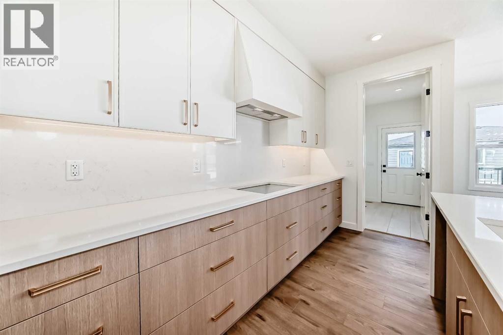 206 Harmony Circle, Rural Rocky View County, Alberta  T3Z 0H8 - Photo 5 - A2278050