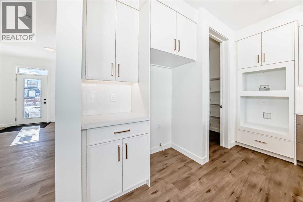 206 Harmony Circle, Rural Rocky View County, Alberta  T3Z 0H8 - Photo 7 - A2278050