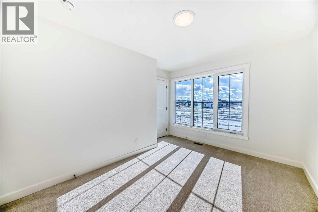 206 Harmony Circle, Rural Rocky View County, Alberta  T3Z 0H8 - Photo 20 - A2278050