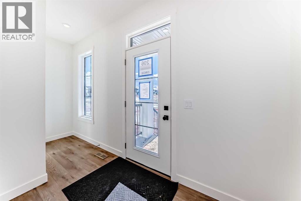 206 Harmony Circle, Rural Rocky View County, Alberta  T3Z 0H8 - Photo 15 - A2278050