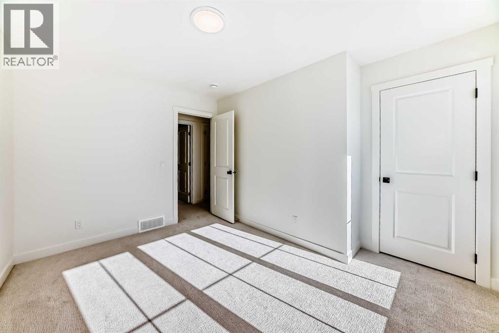 206 Harmony Circle, Rural Rocky View County, Alberta  T3Z 0H8 - Photo 21 - A2278050