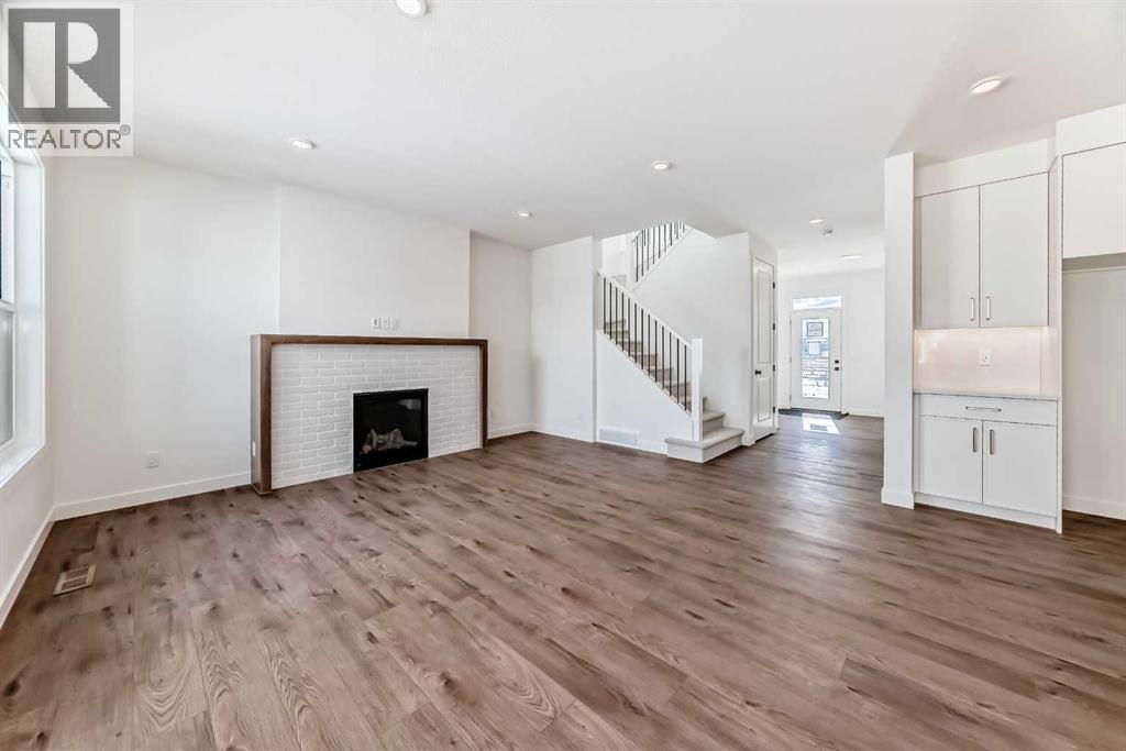 206 Harmony Circle, Rural Rocky View County, Alberta  T3Z 0H8 - Photo 10 - A2278050