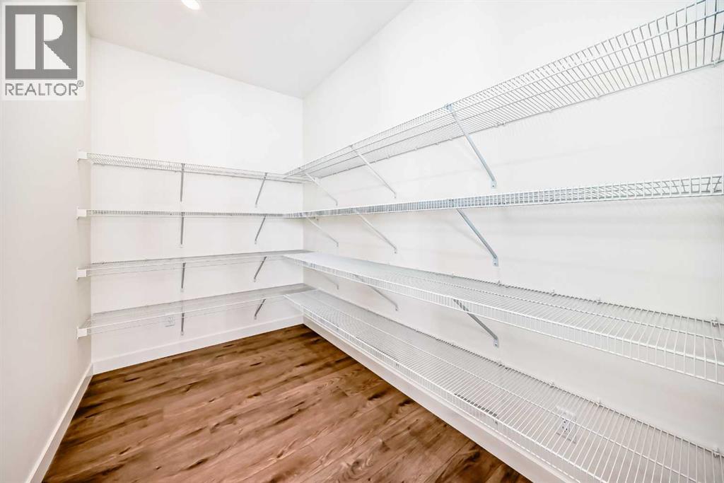 206 Harmony Circle, Rural Rocky View County, Alberta  T3Z 0H8 - Photo 13 - A2278050