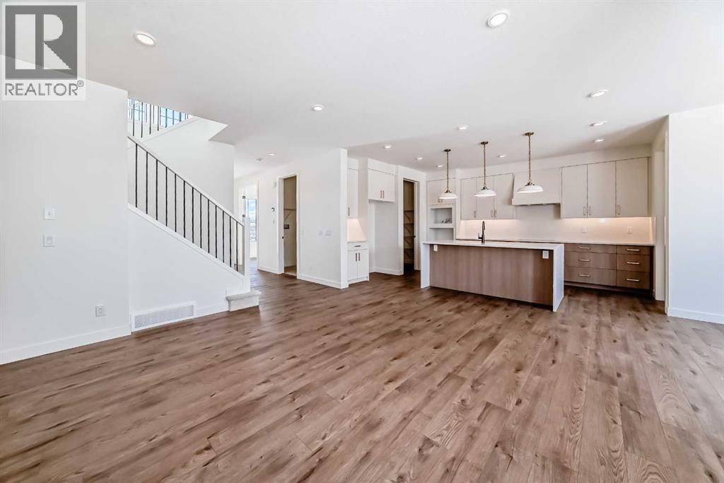 206 Harmony Circle, Rural Rocky View County, Alberta  T3Z 0H8 - Photo 9 - A2278050