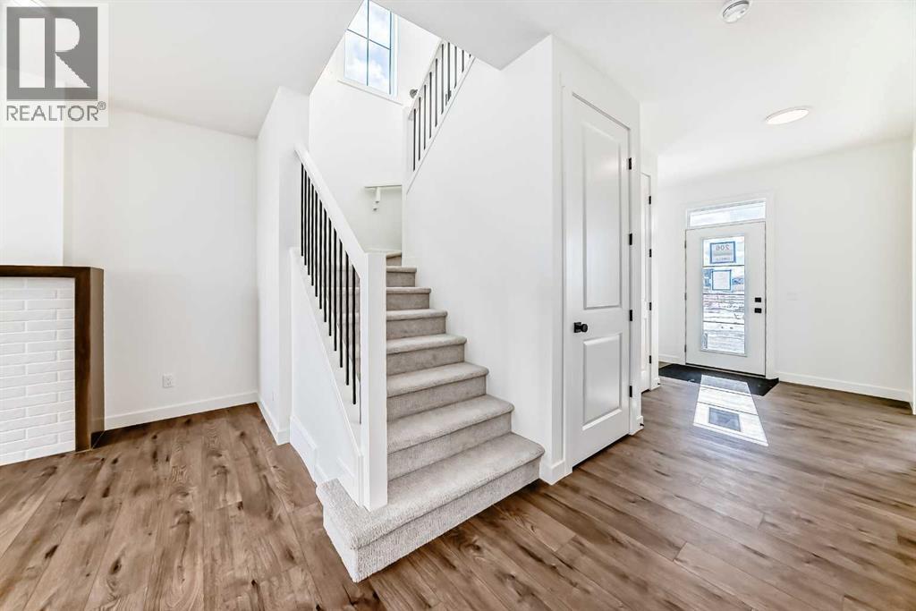 206 Harmony Circle, Rural Rocky View County, Alberta  T3Z 0H8 - Photo 14 - A2278050