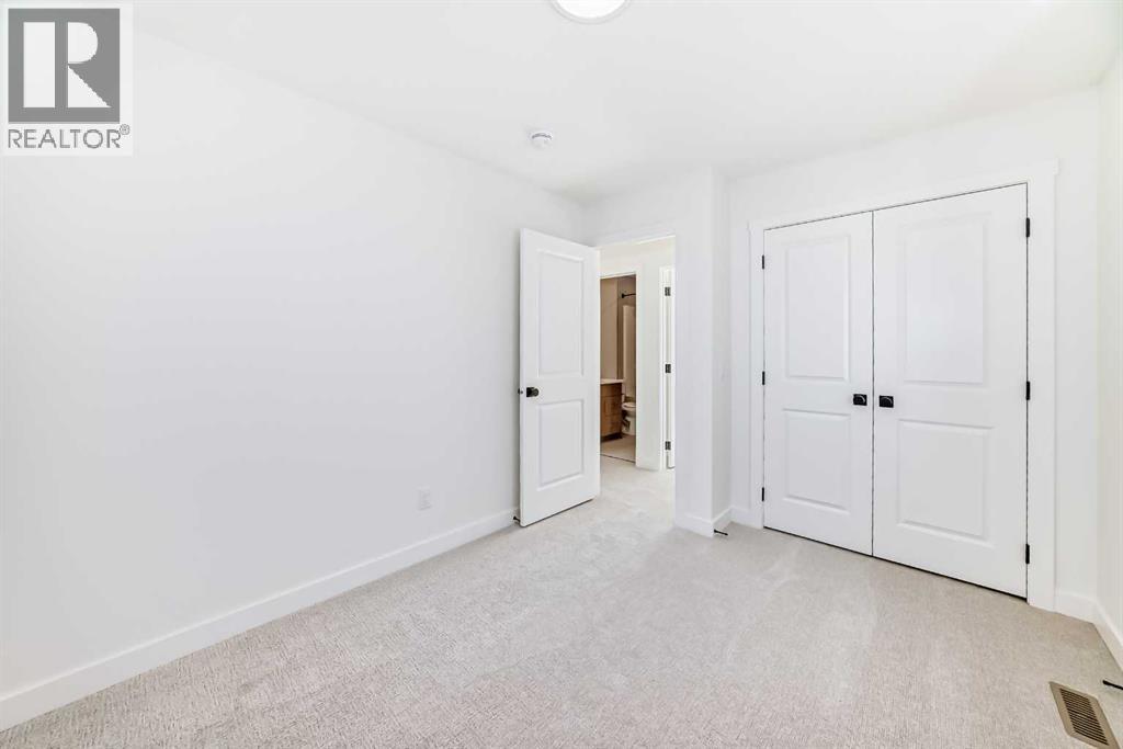 206 Harmony Circle, Rural Rocky View County, Alberta  T3Z 0H8 - Photo 23 - A2278050