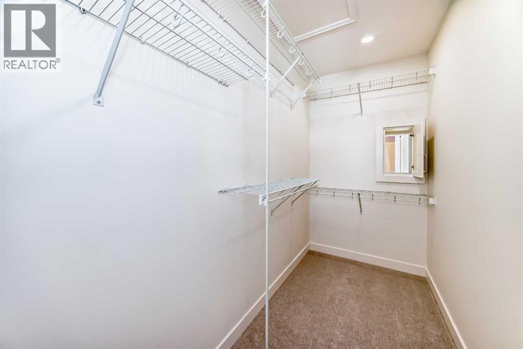 206 Harmony Circle, Rural Rocky View County, Alberta  T3Z 0H8 - Photo 19 - A2278050