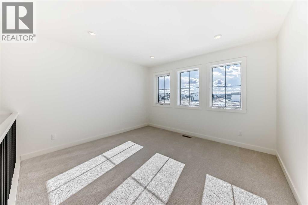 206 Harmony Circle, Rural Rocky View County, Alberta  T3Z 0H8 - Photo 25 - A2278050