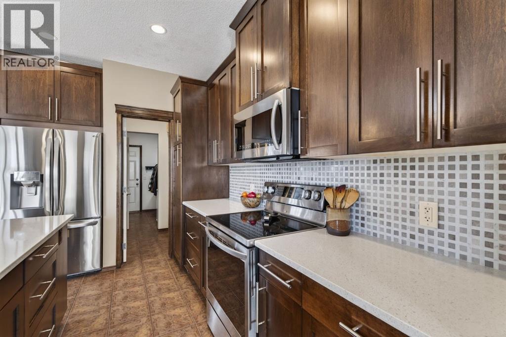 3 Pantego Avenue NW, Calgary, Alberta  T3K 0C4 - Photo 12 - A2289847