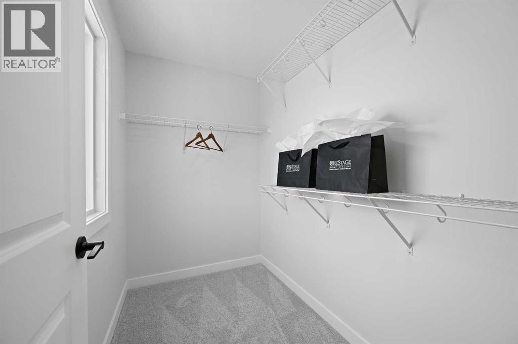 15 Fireside Common, Cochrane, Alberta  T4C 3E1 - Photo 10 - A2292072