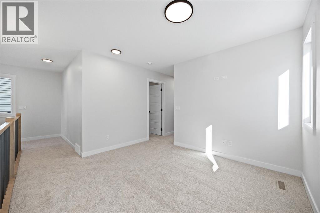 31 Fireside Common W, Cochrane, Alberta  T4C 3E1 - Photo 16 - A2293045