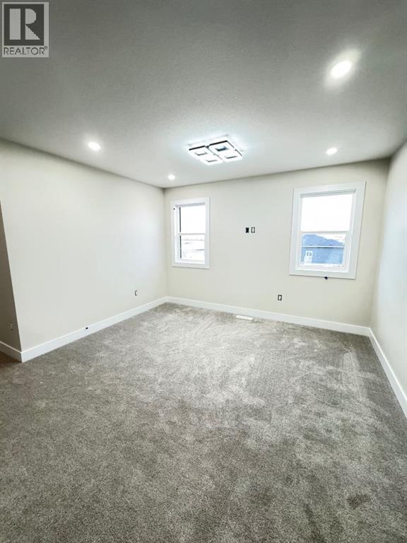 709 Mandalay Avenue, Carstairs, Alberta  T0M 0N0 - Photo 12 - A2287159