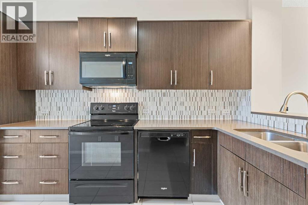 306 Ascot Circle Sw, Calgary, Alberta  T3H 0X2 - Photo 4 - A2294990