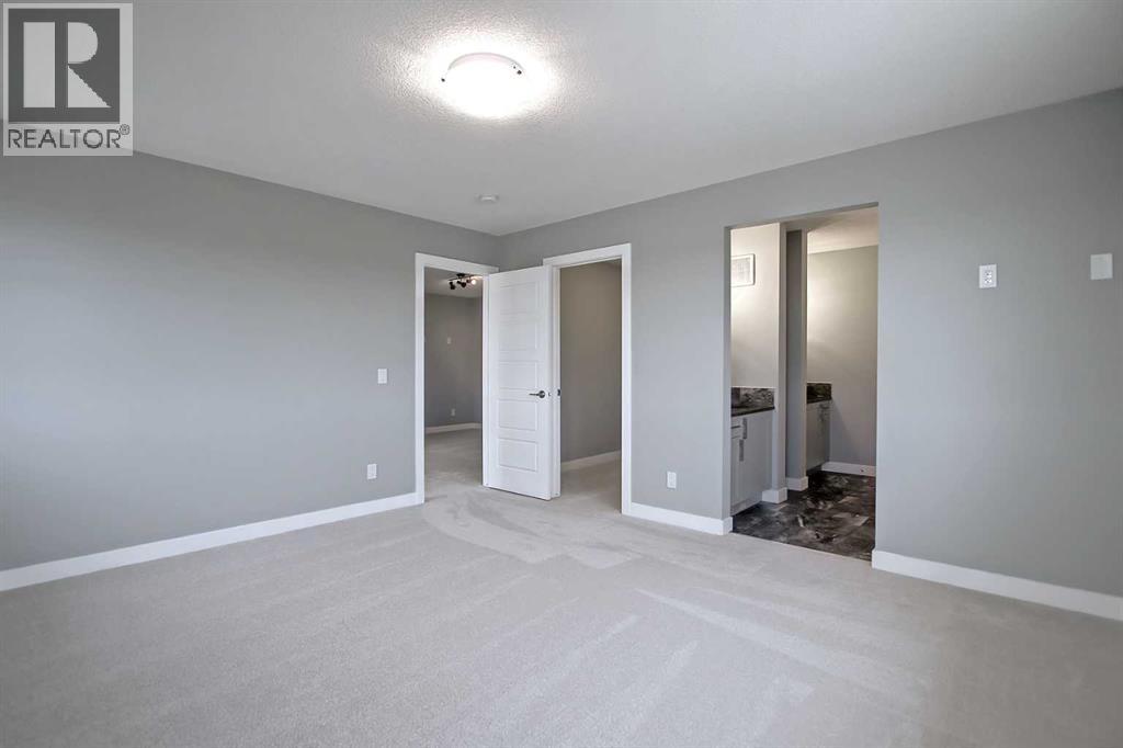 47 Agate Road, Cochrane, Alberta  T4C 3B9 - Photo 30 - A2232172