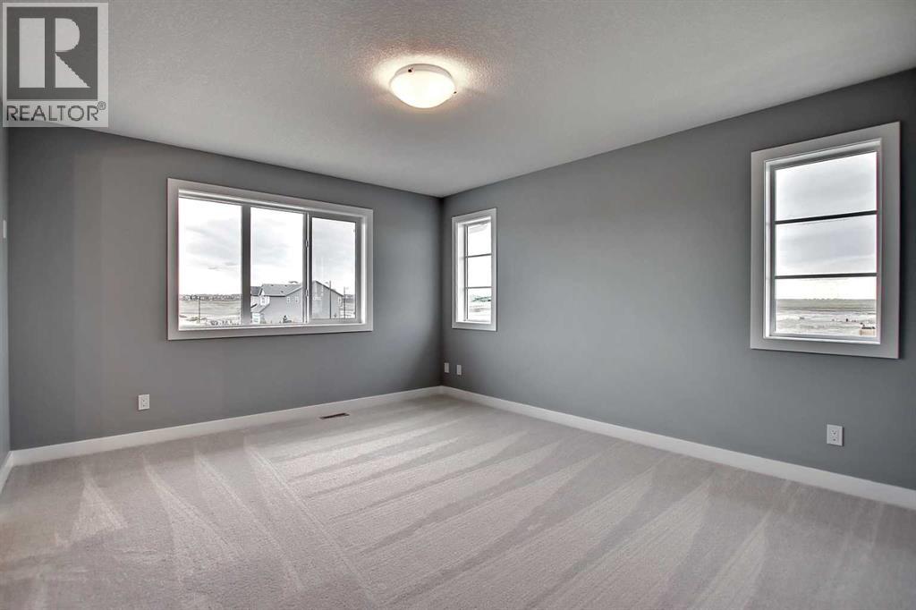 47 Agate Road, Cochrane, Alberta  T4C 3B9 - Photo 28 - A2232172