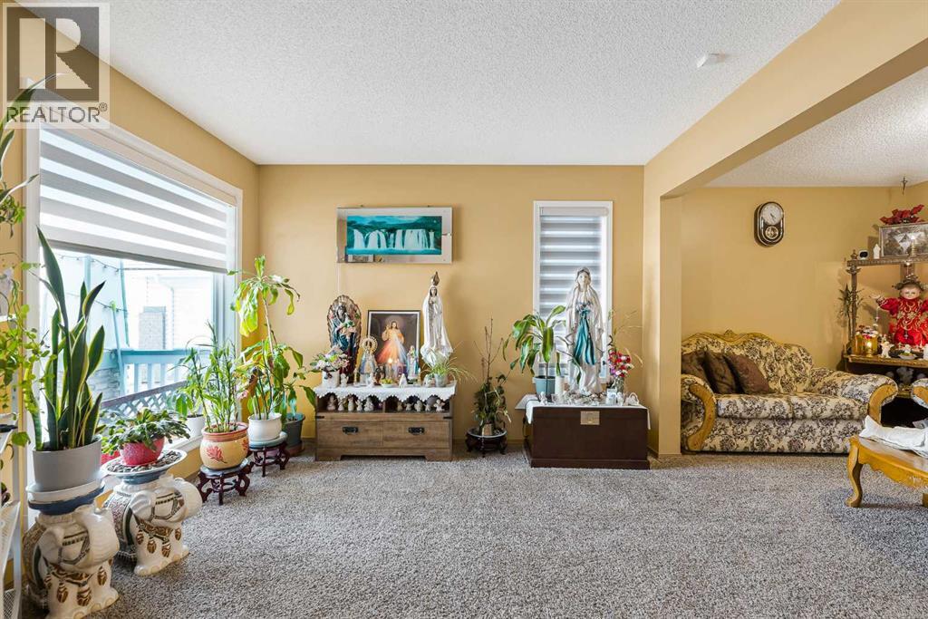 332 Harvest Hills Drive NE, Calgary, Alberta  T3K 4H7 - Photo 4 - A2288215