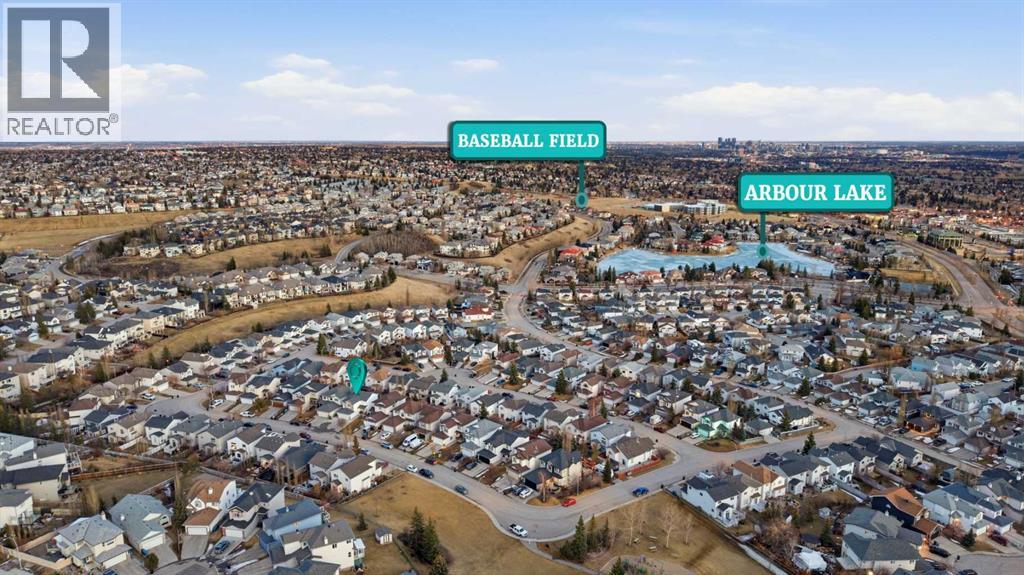 214 Arbour Crest Road NW, Calgary, Alberta  T3G 4L6 - Photo 3 - A2290745