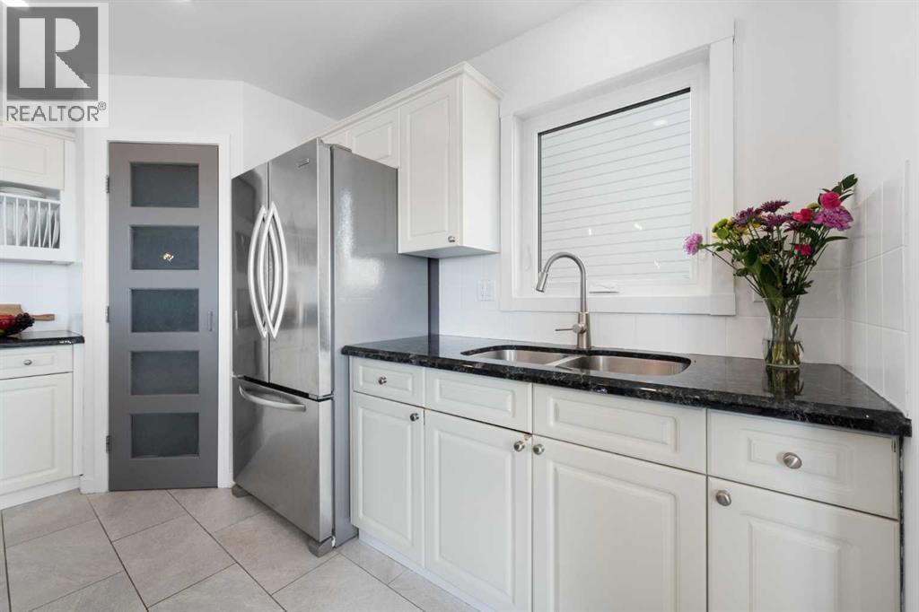 214 Arbour Crest Road NW, Calgary, Alberta  T3G 4L6 - Photo 12 - A2290745