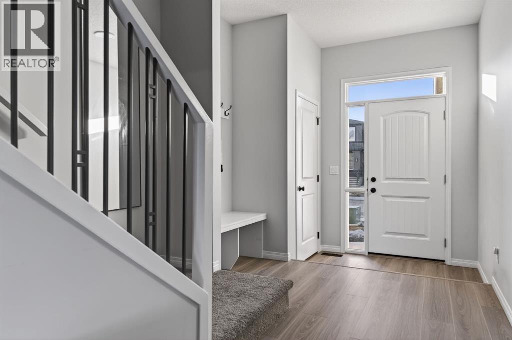 247 Belmont Heath Sw, Calgary, Alberta  T2X 4N4 - Photo 3 - A2283595