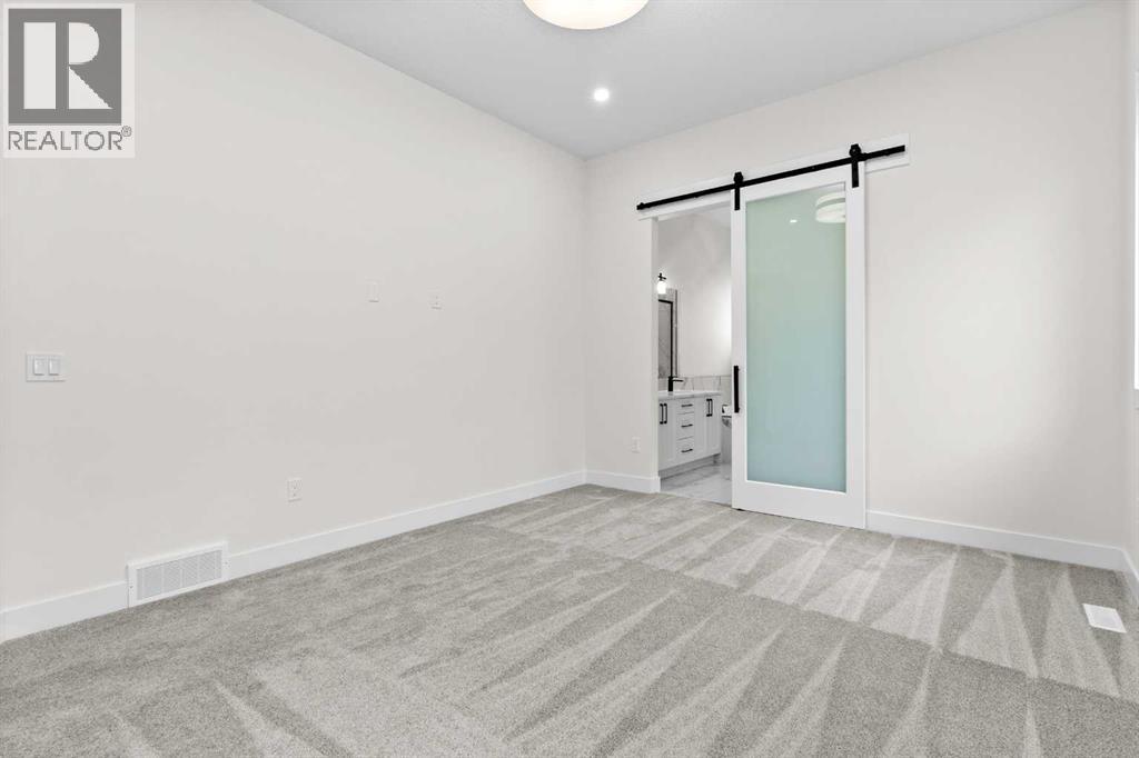 716 Mandalay Avenue, Carstairs, Alberta  T0M 0N0 - Photo 11 - A2254899