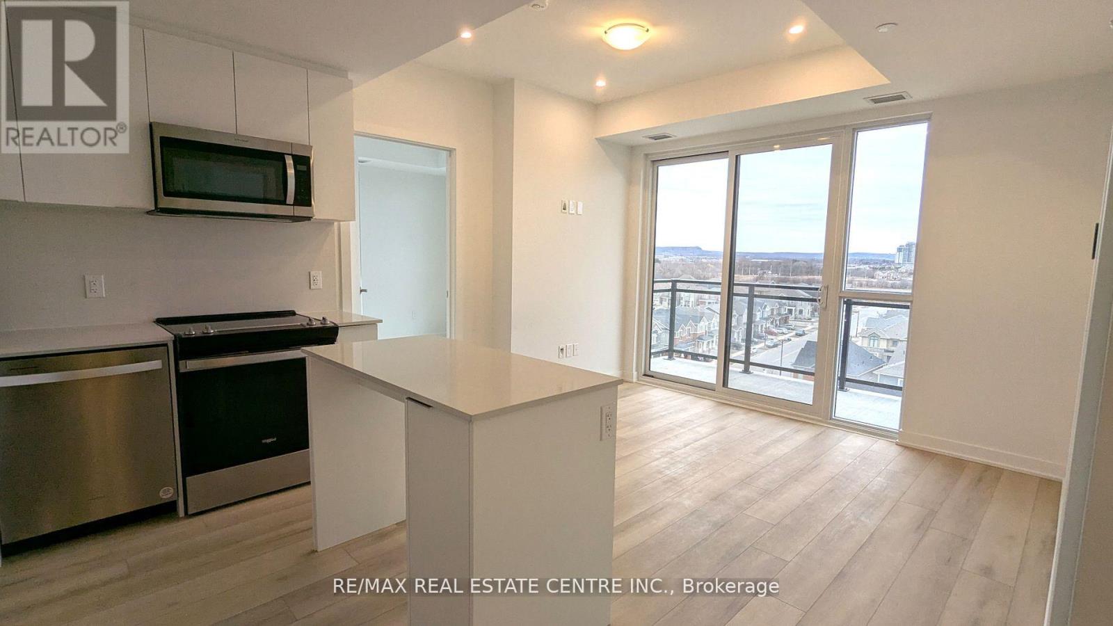 717 - 770 Whitlock Avenue, Milton, Ontario  L9E 1S2 - Photo 5 - W12906906