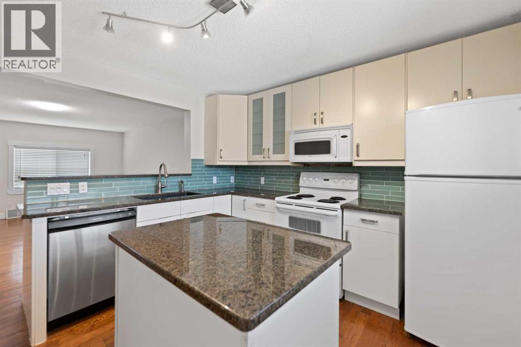 818 68 Avenue SW, Calgary, Alberta  T2V 0N4 - Photo 13 - A2295329