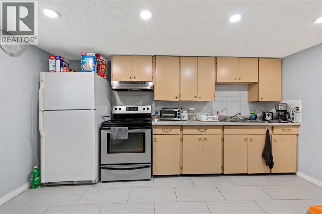 818 68 Avenue SW, Calgary, Alberta  T2V 0N4 - Photo 21 - A2295329