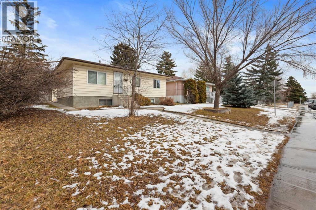 818 68 Avenue SW, Calgary, Alberta  T2V 0N4 - Photo 2 - A2295329