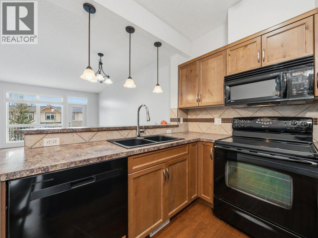 5, 172 Rockyledge View NW, Calgary, Alberta  T3G 6B2 - Photo 2 - A2295035