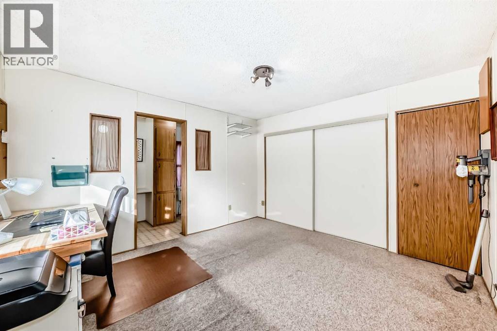 3227 Burroughs Manor NE, Calgary, Alberta  T1Y 6K1 - Photo 14 - A2290599