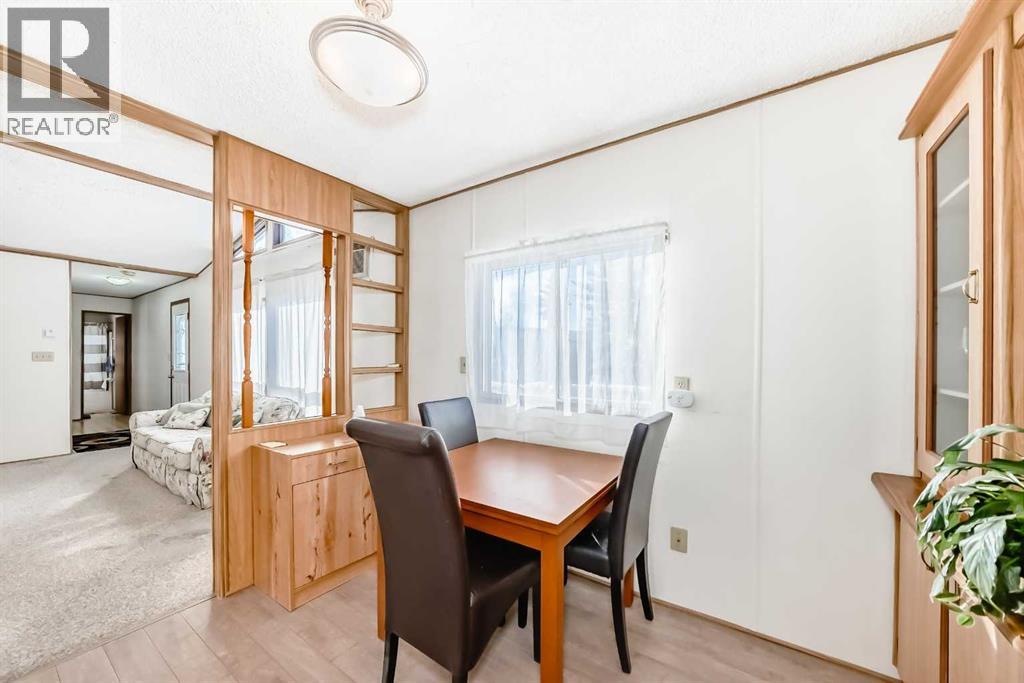 3227 Burroughs Manor NE, Calgary, Alberta  T1Y 6K1 - Photo 10 - A2290599