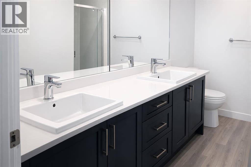 405, 205 Spring Creek Common SW, Calgary, Alberta  T3H 6H4 - Photo 20 - A2295322