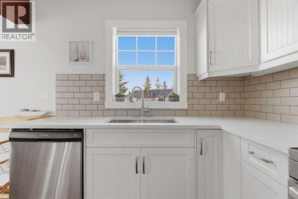 212 Cottageclub Crescent, Rural Rocky View County, Alberta  T2K 1B3 - Photo 13 - A2291790