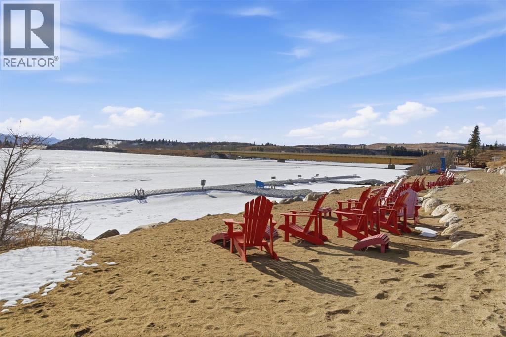 212 Cottageclub Crescent, Rural Rocky View County, Alberta  T2K 1B3 - Photo 5 - A2291790