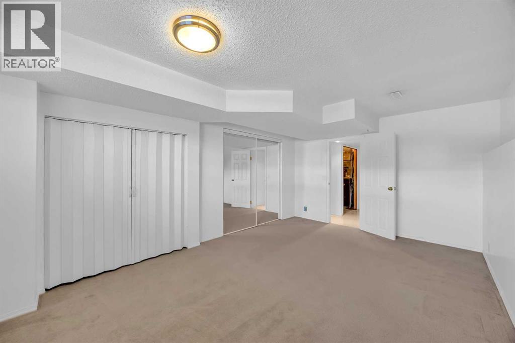 40 Cedargrove Way SW, Calgary, Alberta  T2W 4V1 - Photo 39 - A2292650